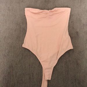 Pink body suit
